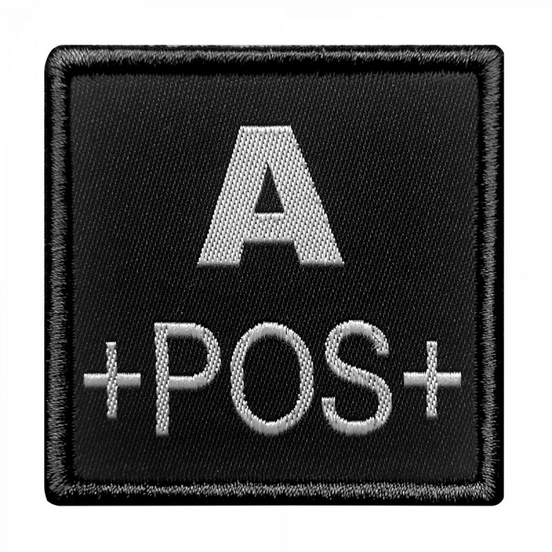 Groupe sanguin A positif brodé sur tissu noir Groupe sanguin A positif brodé sur tissu noir