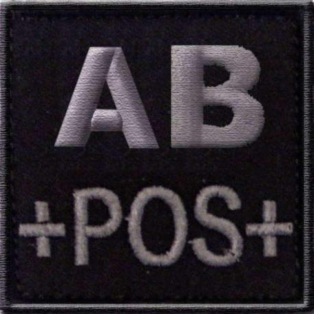 Groupe sanguin AB positif brodé sur tissu noir Groupe sanguin AB positif brodé sur tissu noir