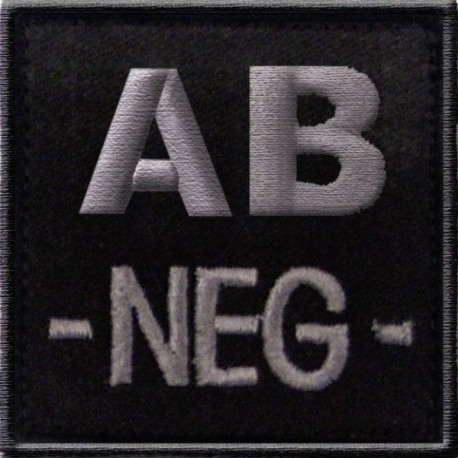 Groupe sanguin AB négatif brodé sur tissu noir Groupe sanguin AB négatif brodé sur tissu noir