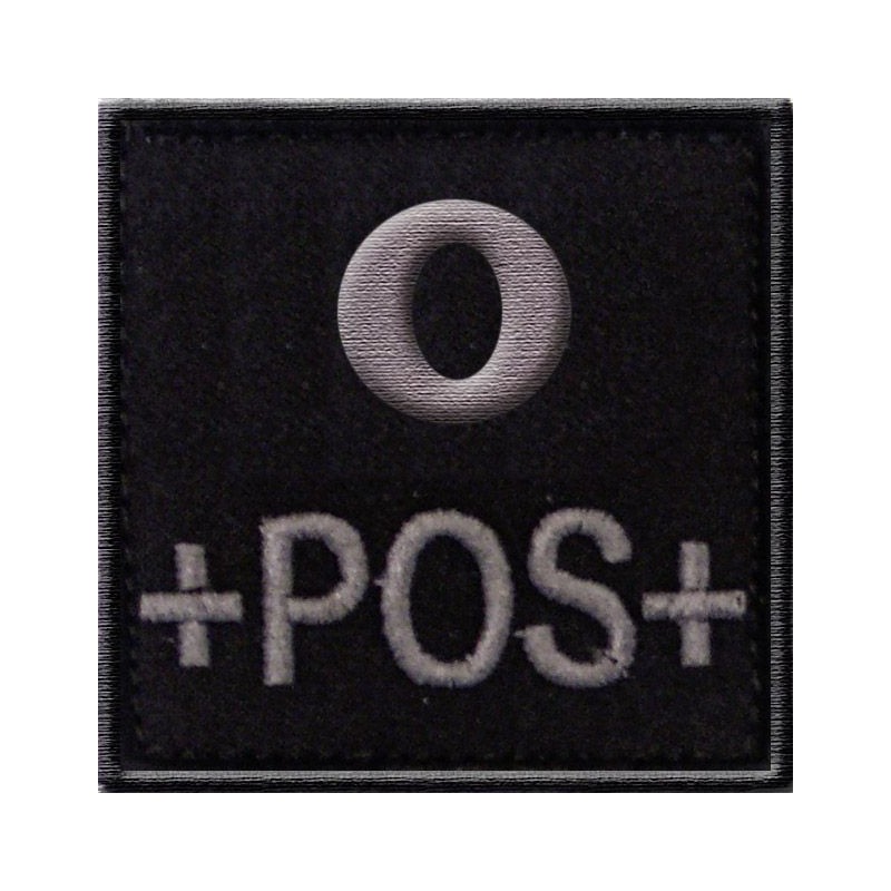 Groupe sanguin O positif brodé sur tissu noir